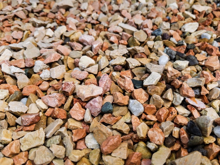 Elegant gravel driveway with natural stones